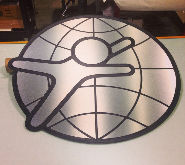 3A_Composites_Graphic_Display_USA_Dibond_ACM_Rigoleonart_MCH_Logo_Brush_Aluminum.jpg